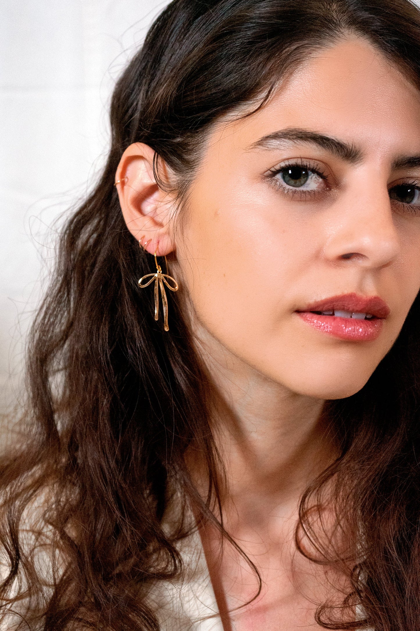 Delicate Gold bow earrings